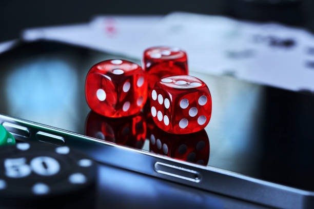 Live dealer rolling under professional studio lighting Lightning Dice live dealer rolling three dice under studio lights